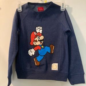 Mario running sweatshirt Nintendo brand and logo on the front and back,small 6-9